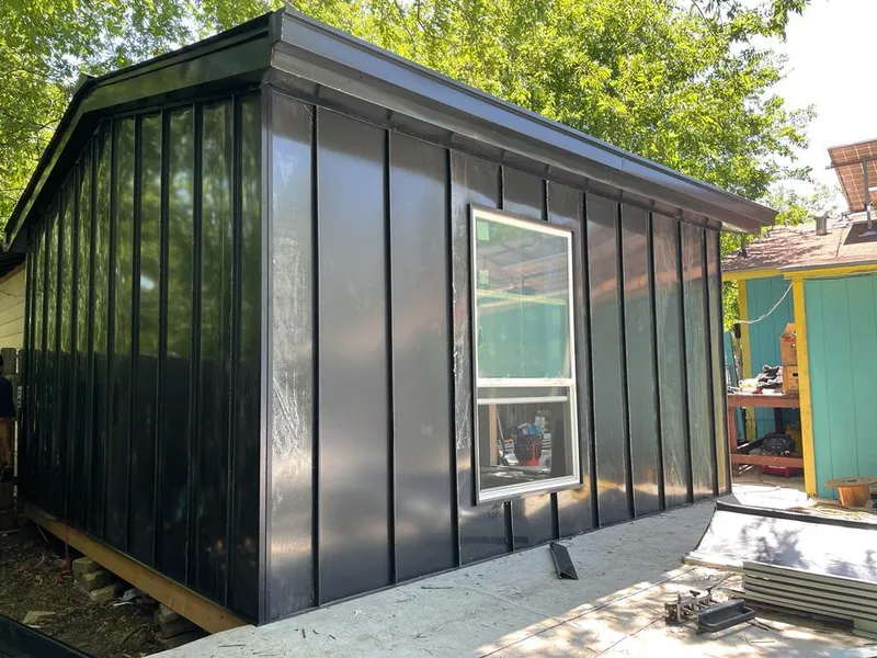 Black standing seam metal wall panels for Metal Roof Installation in Delta